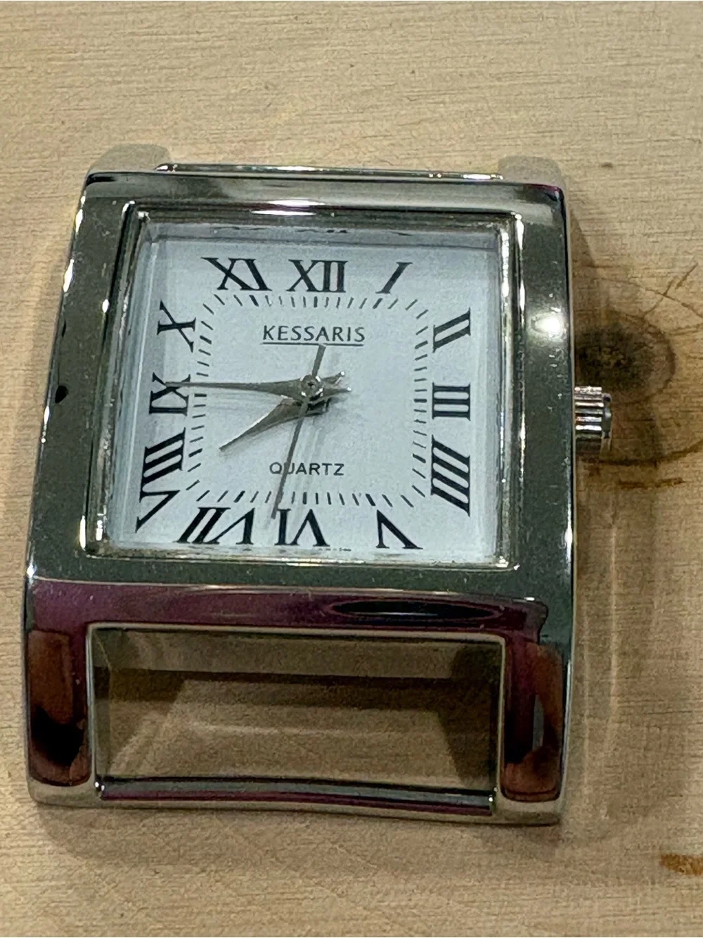 Kessaris silver square face with 6 cloth bands watch in GUC needs new battery